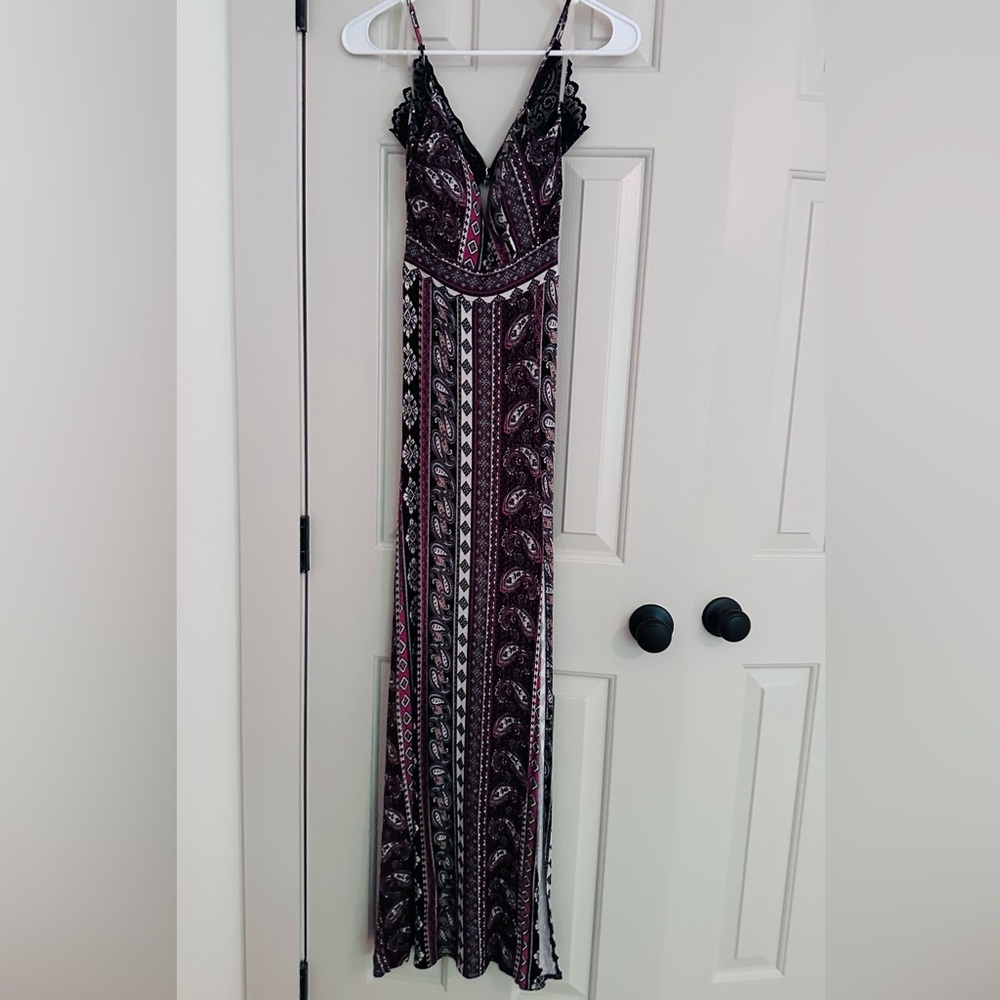 Long maxi dress with lace detailed back.